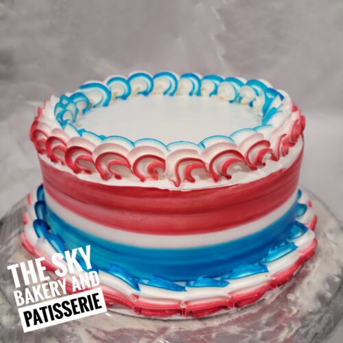 C004 - Small blue and red colorful cake top white